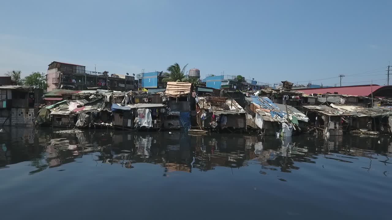Aerial of Slum Area along the polluted canal in Tondo Manila, Philippines