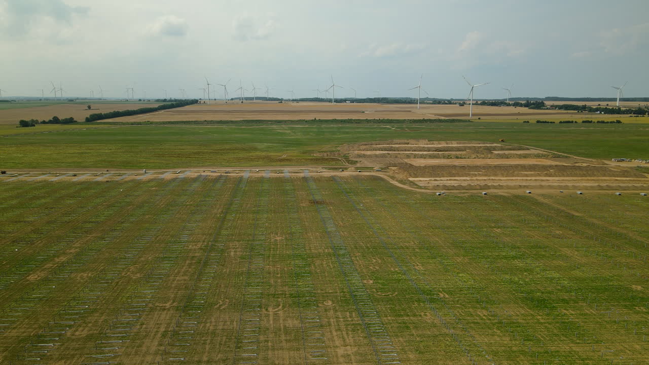 Green Field Farm For Building Site Of The Largest Photovoltaic Solar Cells Near Zwartowo, Poland In Central Europe