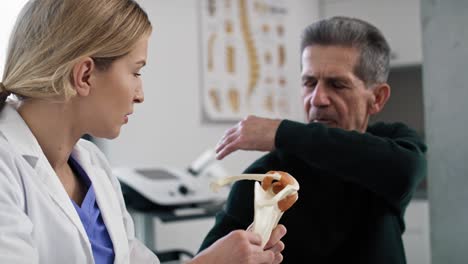 Female-caucasian-doctor-talking-with-her-patient.