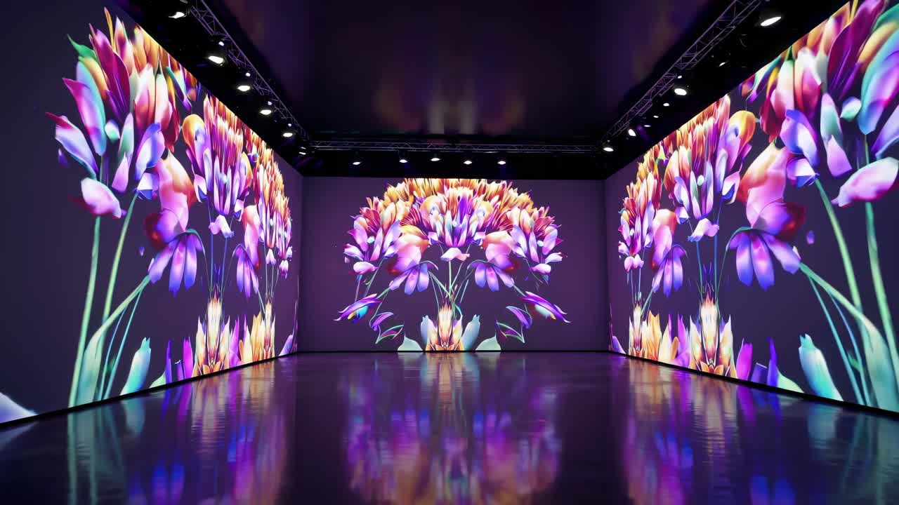 Immersive video art installation with vibrant floral projections on walls