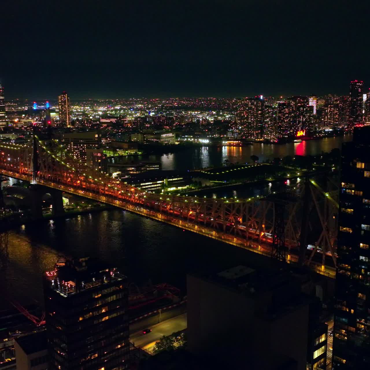 Eye-catching sight of Queensboro Bridge in beautiful lights. Amazing cityscape full of lights at night