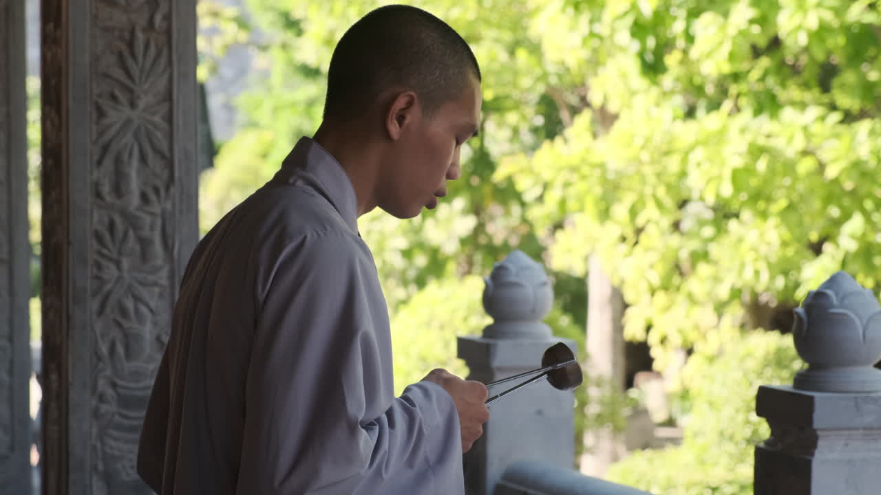 Buddhist Monk Performing a Ceremony