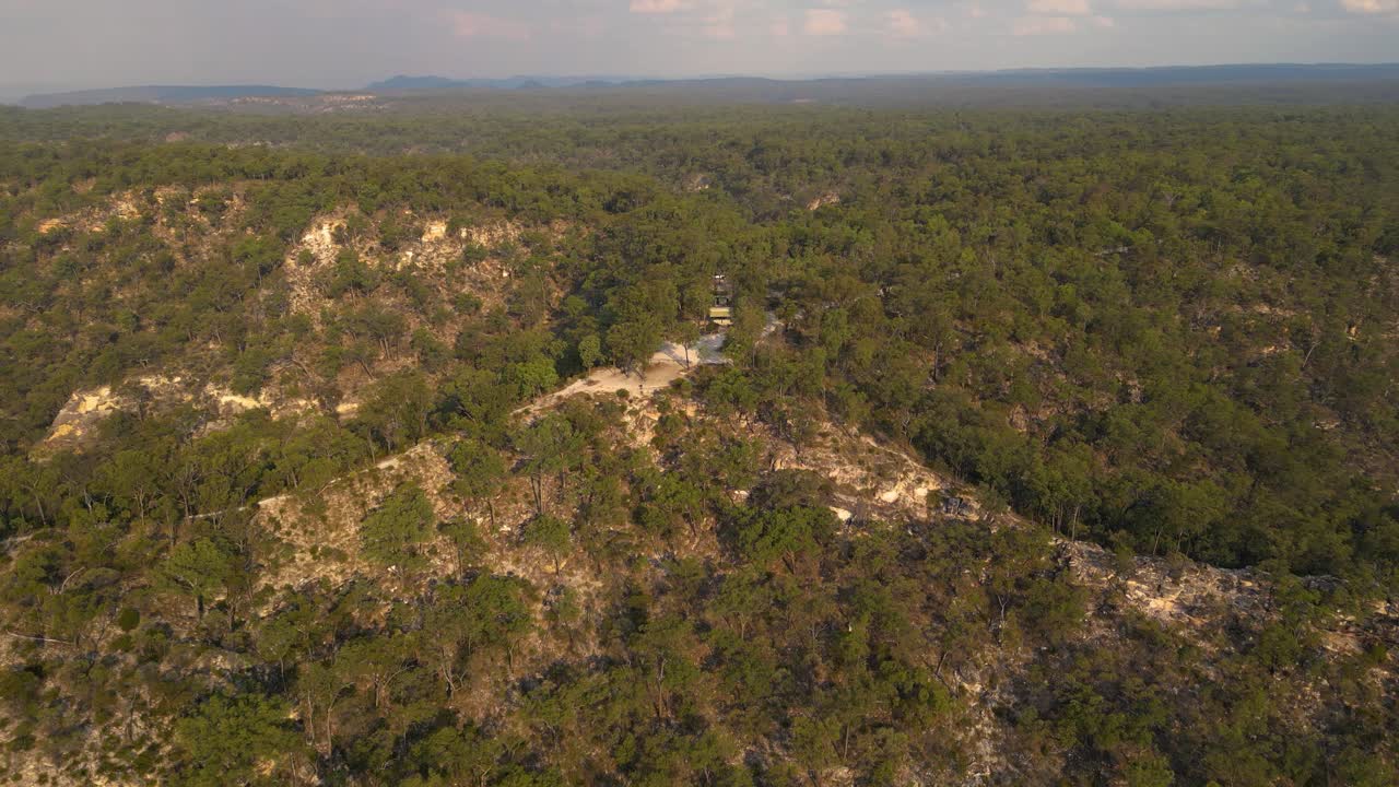 Aerial View of a Hilly Forest Landscape