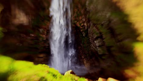 tilt shift view of a tropical waterfall in paradise