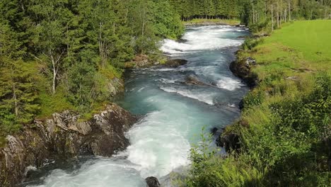 milky blue glacial water from the kjenndalsbreen glacier. beautiful nature norway natural landscape. lovatnet lake lodal valley.