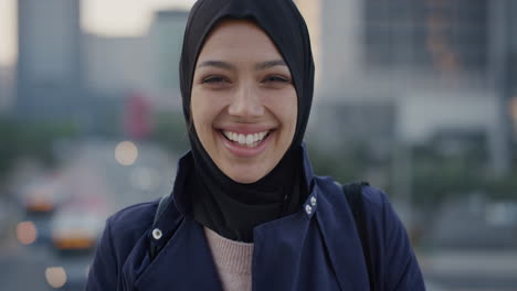 portrait successful young muslim business woman laughing enjoying independent urban lifestyle in city professional female wearing hijab headscarf slow motion