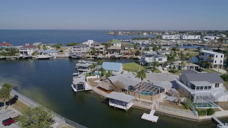 4K-Drone-Video-of-Beach-and-Waterfront-Homes-on-Canals-in-Hudson-Beach-on-the-Gulf-of-Mexico-in-Florida