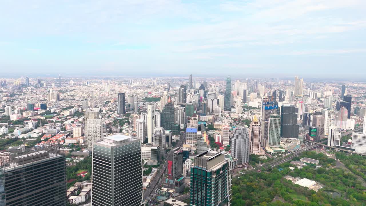 Lumphini Park, King Power Mahanakhon and some other buildings in Bangkok, drone view
