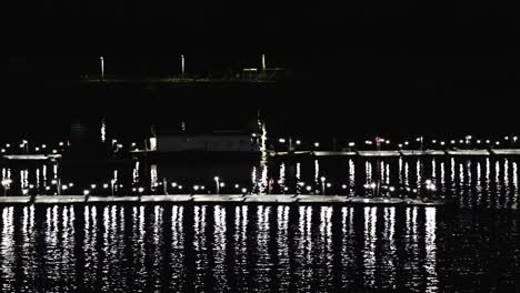 san diego bait barge at night with lights on