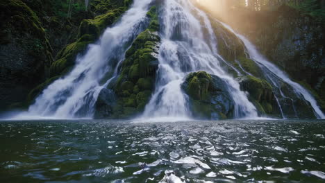 majestic waterfall cascading over mossy rocks in a lush forest