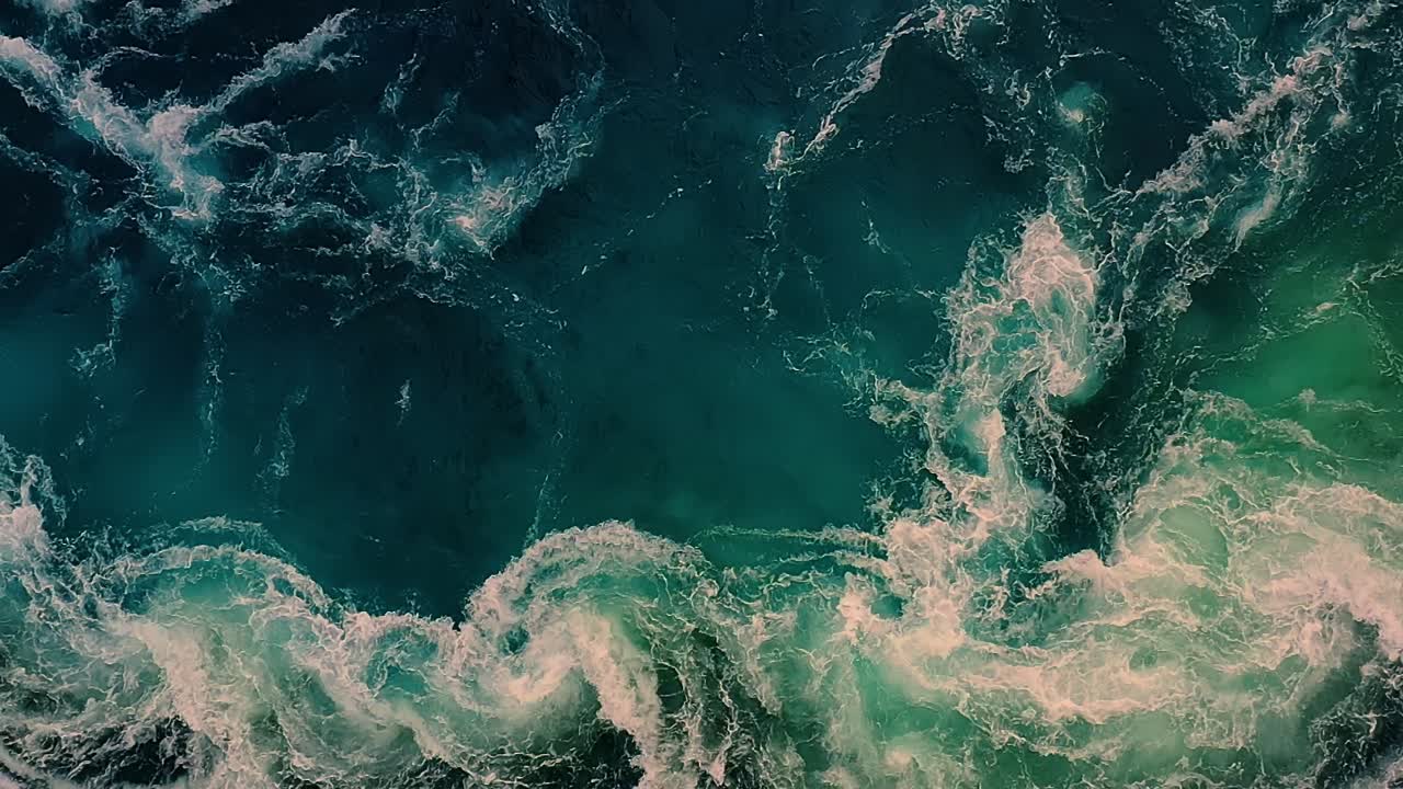 Waves of water of the river and the sea meet each other during high tide and low tide.