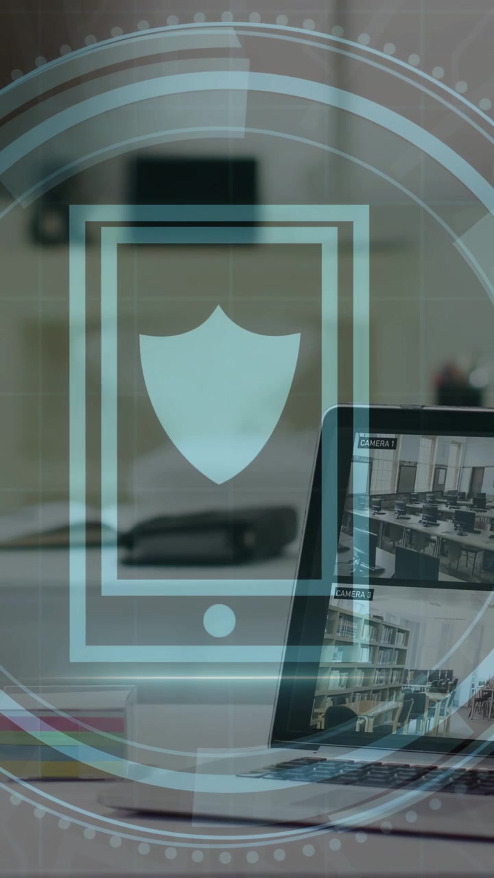 Vertical video: Laptop cam starting rings, mobile shield showing, pulsing and showing security