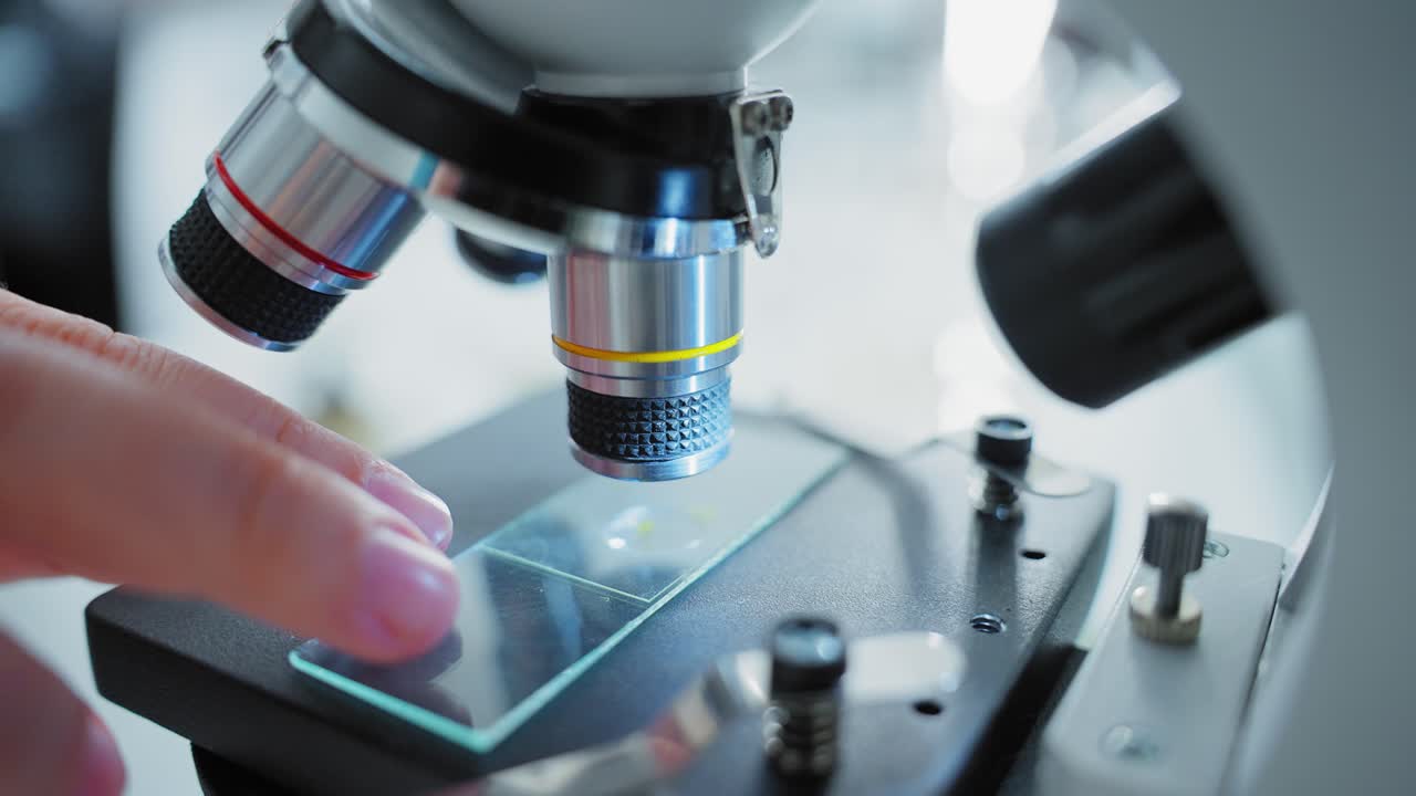 Close-up of a microscope in use
