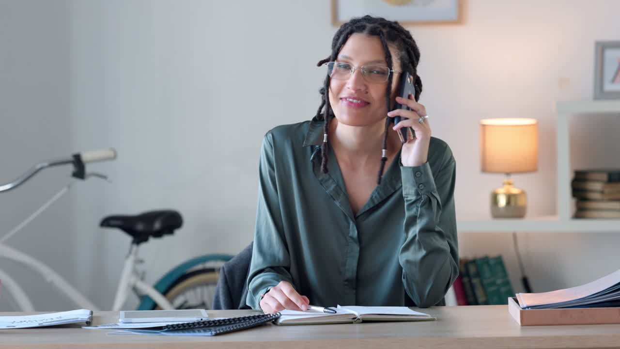 Social media manager talking on phone