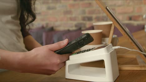 Close-Up-of-Contactless-Phone-Payment-01