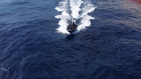 fantastic aerial shot from the bow of a high-speed boat of the national customs police