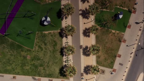 aerial view of a park with playground and walking paths