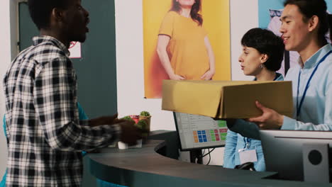 couple taking online order from worker