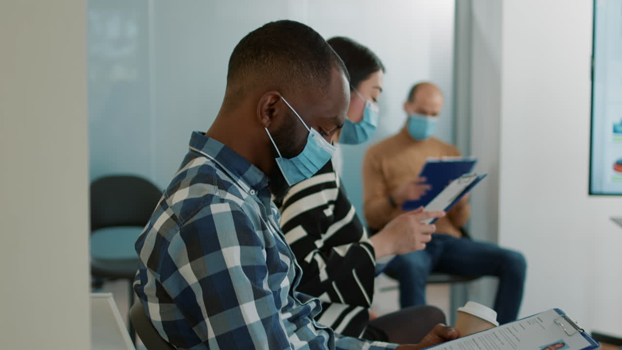 African american recruit with cv file waiting to attend job interview