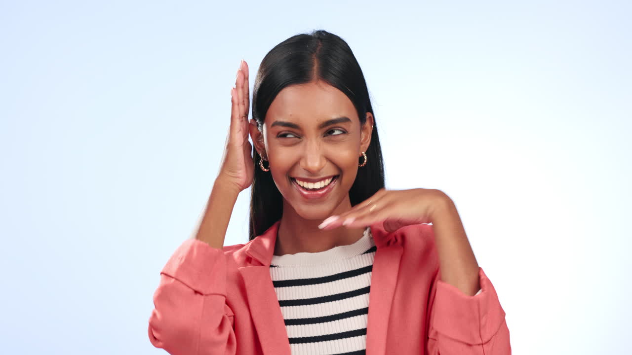 Face, hands frame or happy woman in studio on blue