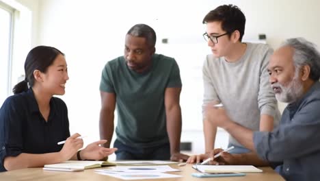 dynamic collaboration in a team meeting: engaging discussion among diverse professionals on project development and problem solving