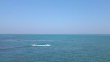 aerial view of vast blue sea water in bay of bengal