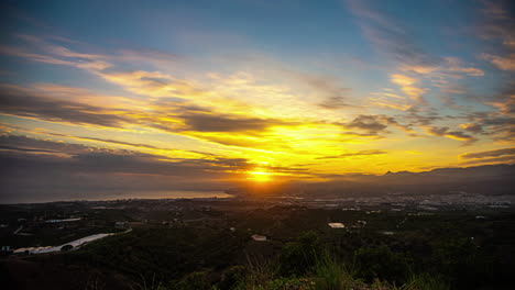 Filmischer-Zeitraffer-Des-Sonnenuntergangs-In-Malaga,-Spanien