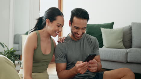 Couple,-phone-and-reading-on-floor