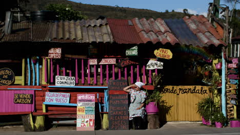 woman sitting outside the restaurant