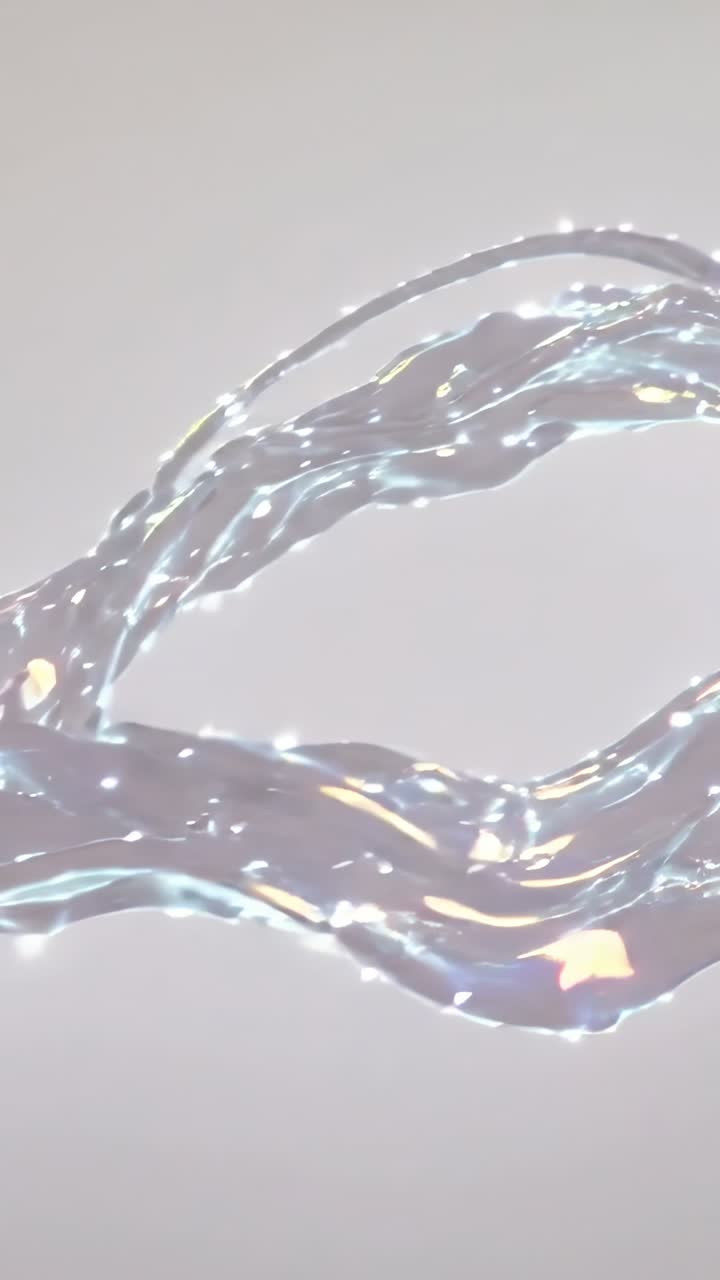 Vertical video: Flowing two glassy ribbons gliding across gray backdrop, driven by sim with flecks