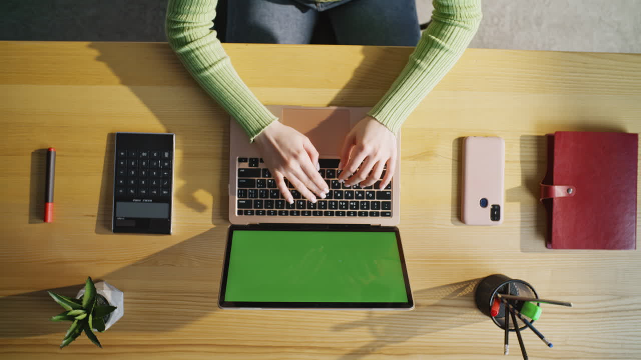 Student hands working keyboard at table closeup. Woman typing laptop top view
