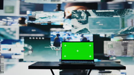 modern army command center with laptop running chroma key screen