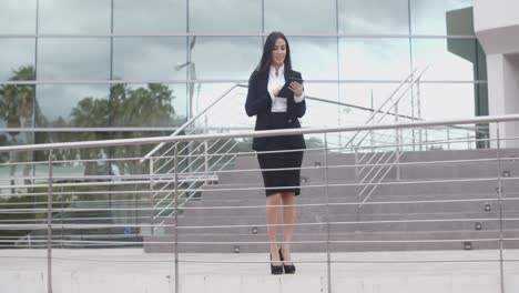 Young-businesswoman-holding-a-tablet-pc