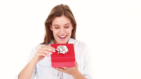 happy woman opening a gift