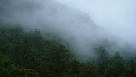 Misty Mountains Scenery in Nepal, Exotic Tropical Scenery of Green Trees in Blue Mist in Mysterious Moody Atmospheric Landscape in Himalayas Mountains Foothills in Nepal
