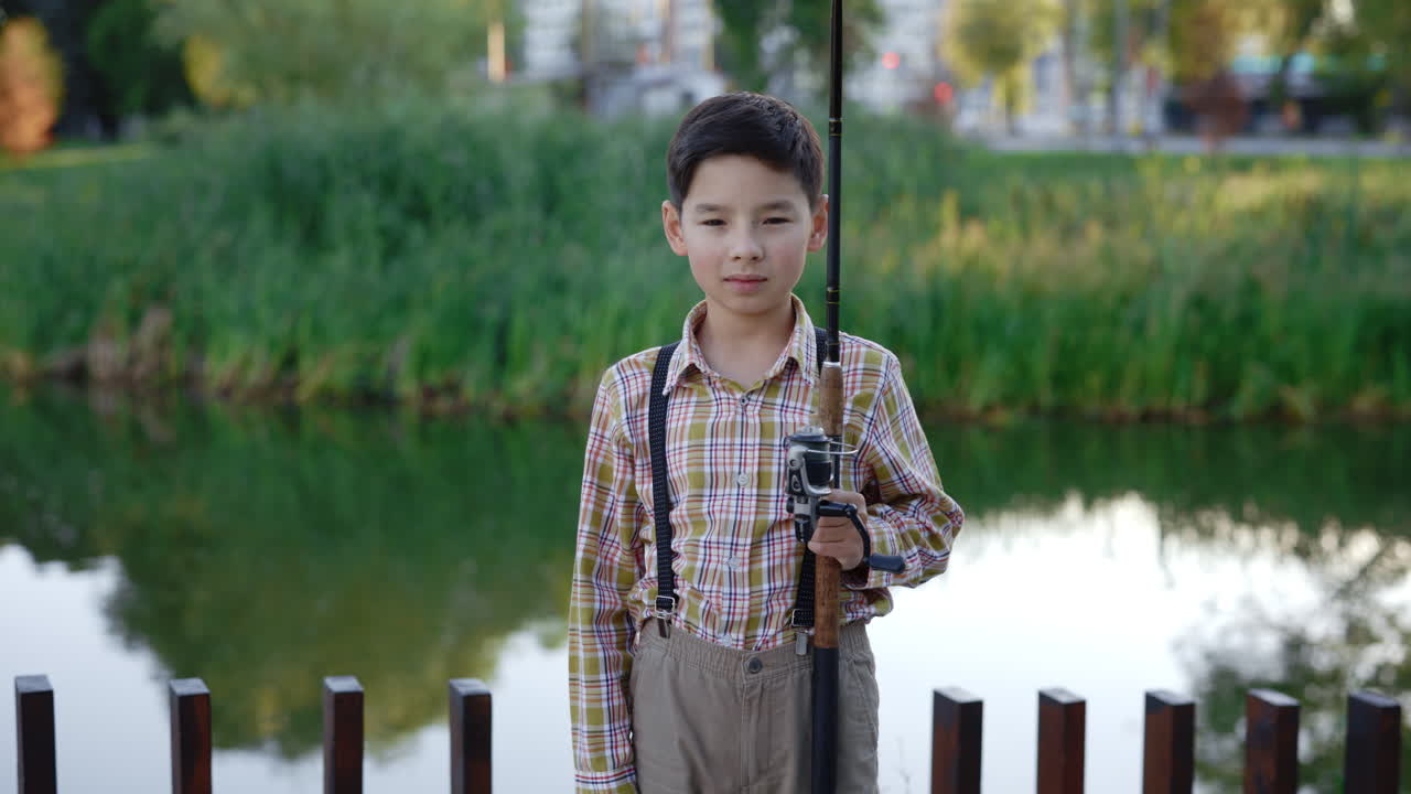 Boy Fishing in a Park