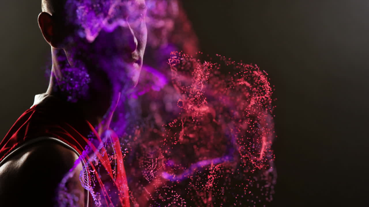 animación de partículas rojas sobre un jugador de baloncesto afroamericano