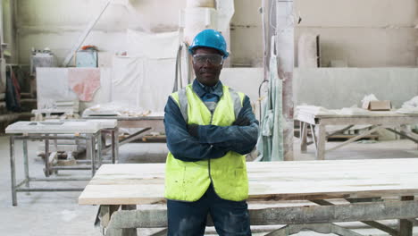 man wearing protective gear in factory