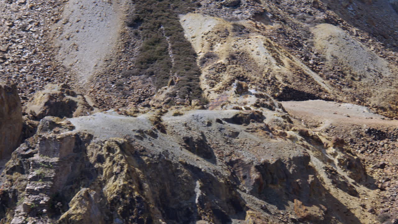mid panning shot of the Great opencast mine at mynydd parys mountain copper mine