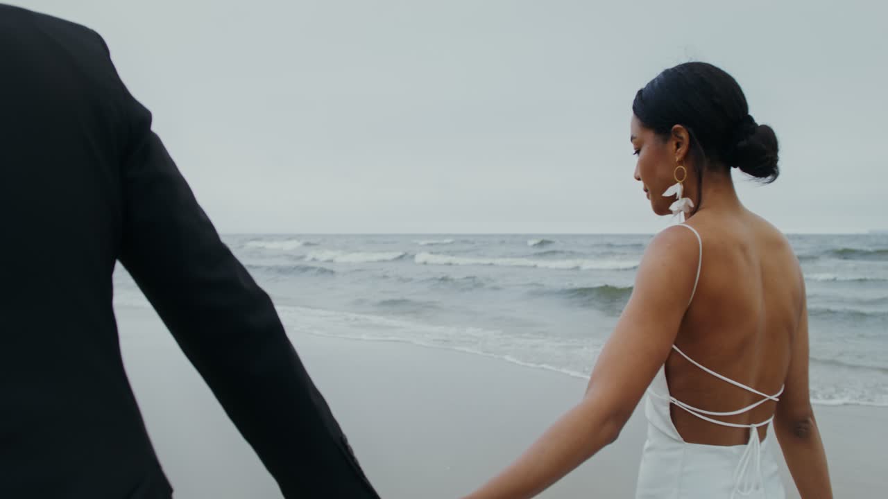 Couple Celebrating Wedding on the Beach