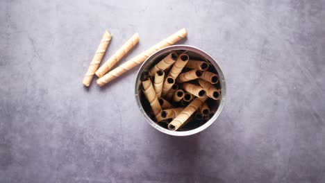 chocolate wafer rolls in a tin can