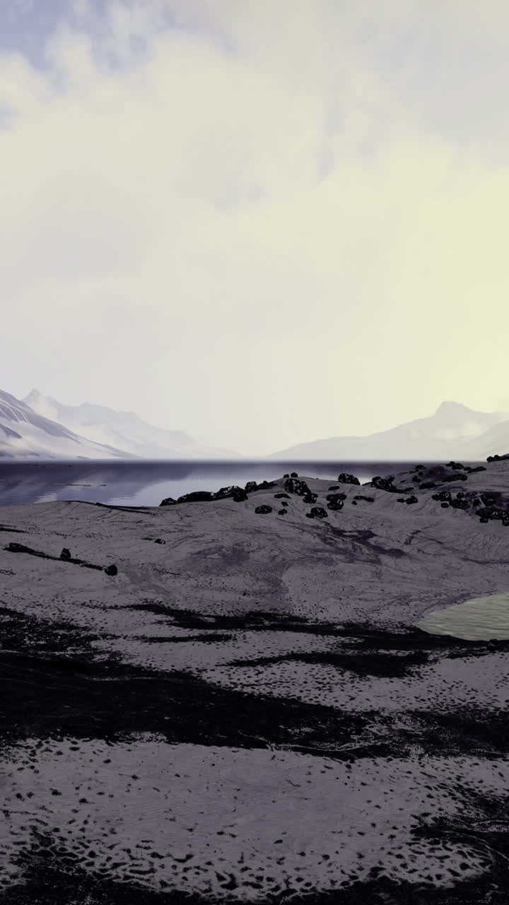 Serene landscape of volcanic terrain and tranquil waters at dawn