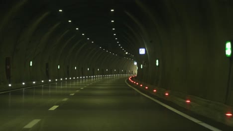 tunnel illuminated with safety lights. slow motion. 4k