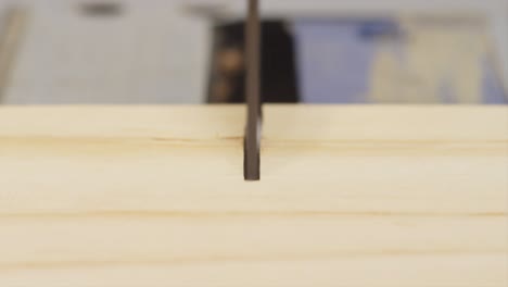 table saw cutting plywood