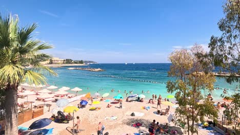 tourists enjoying a sunny beach day