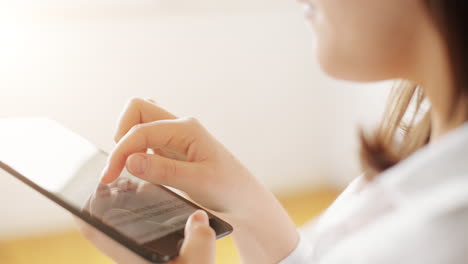 woman hand using tablet computer surface touchscreen pad