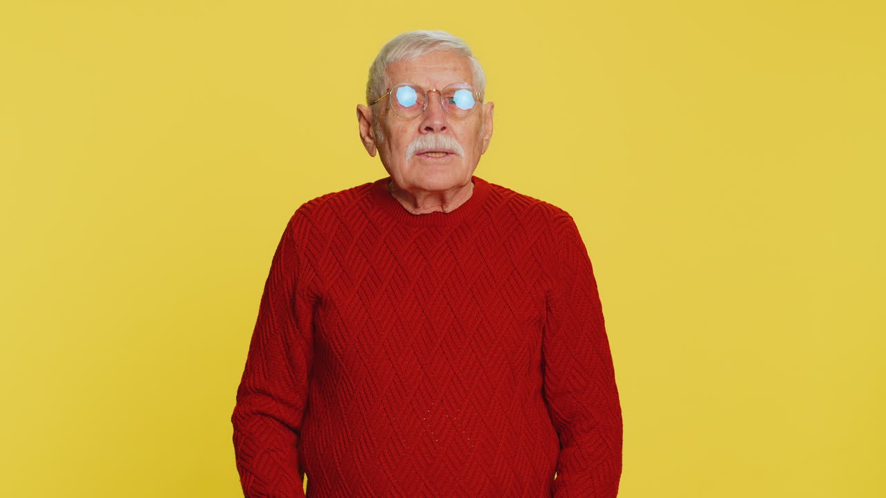 Exhausted tired senior man takes off glasses rubbing eyes feels pain sleepy exhausted overwork