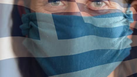 greek flag waving against woman wearing face mask
