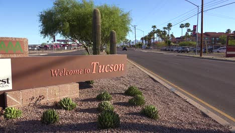 a roadside sign welcomes visitors to tucson arizona