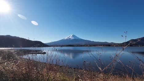 mt fuji clear sunny day with reflection on the lake showing the reflection of mount fuji, or snow mountain in japan